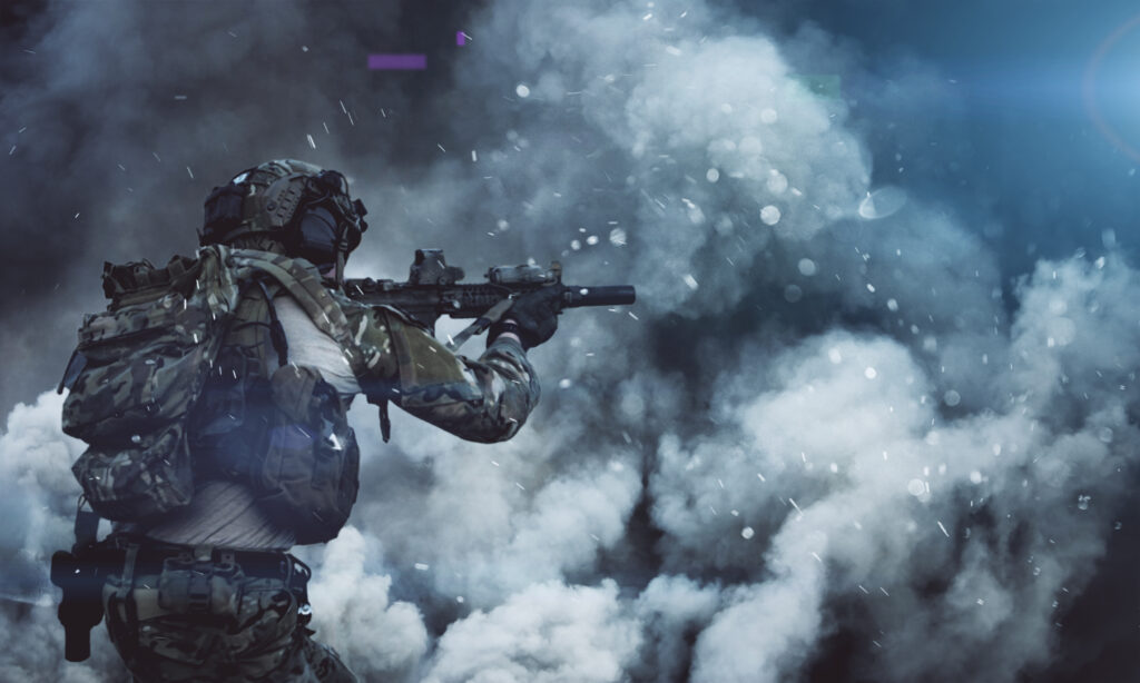 Military soldier between smoke and dust in battlefield
